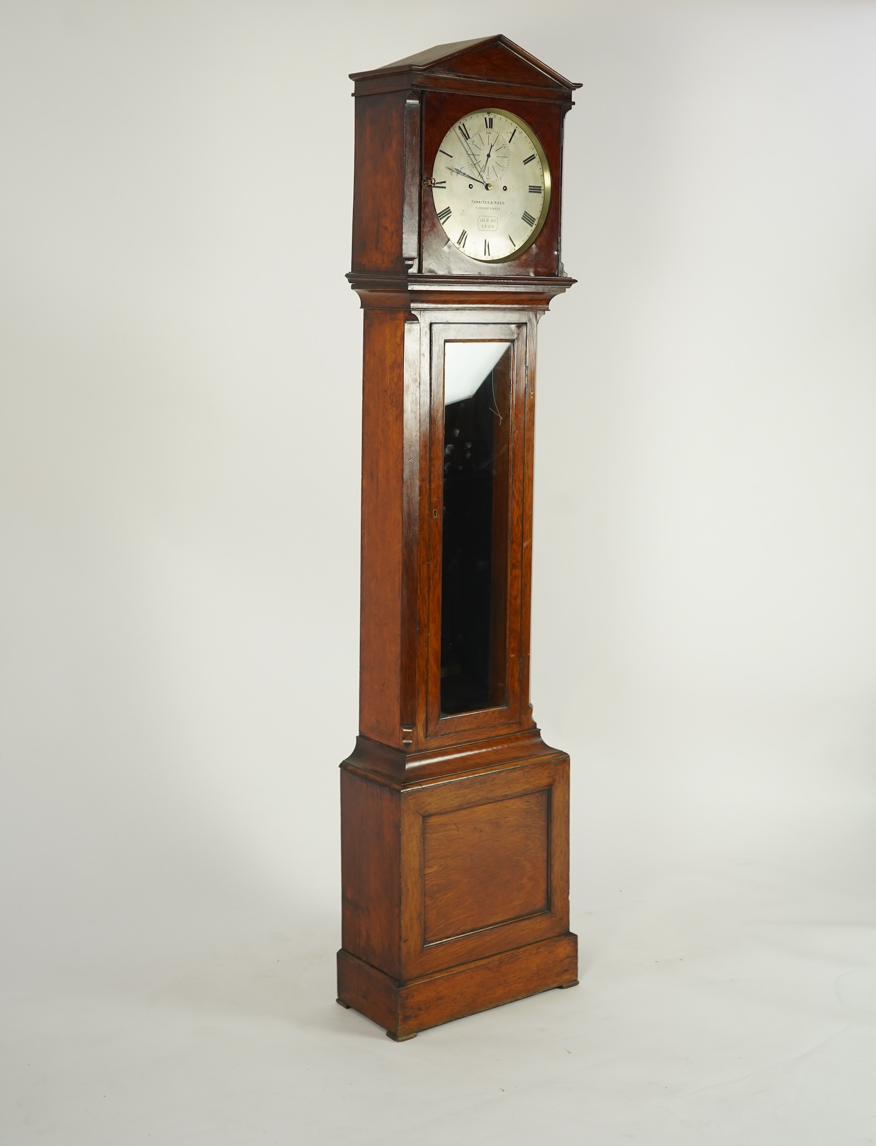 A mid 19th century oak eight day longcase regulator, circular silvered dial signed Thwaites & Reed, Clerkenwell, WTW 1848
